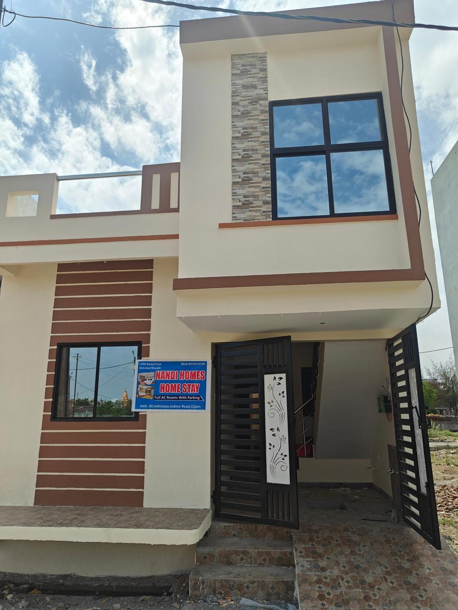 Nandi Homes Homestay Ujjain Exteriör bild